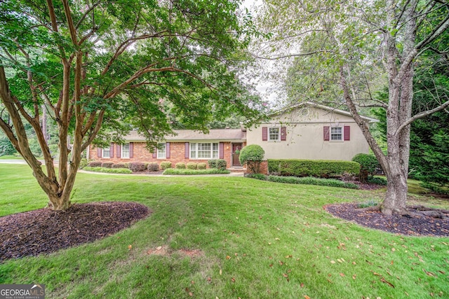 view of front of house with a front yard