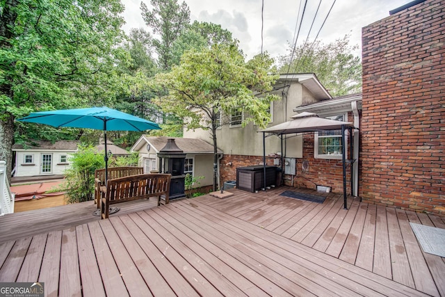 wooden deck with a gazebo