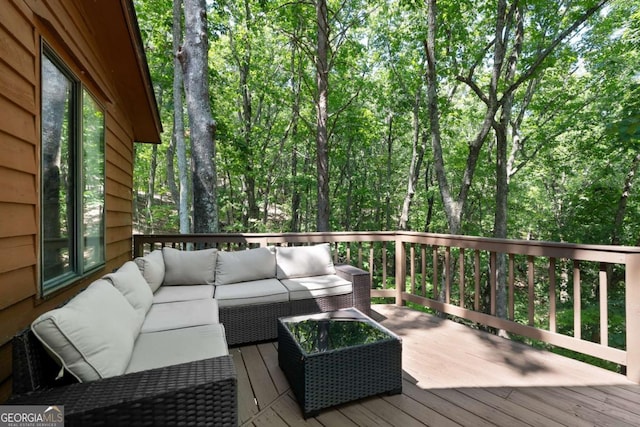 deck with an outdoor hangout area