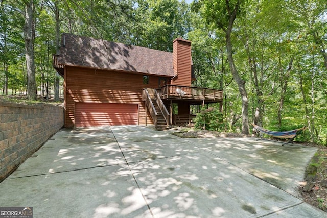 exterior space featuring a wooden deck