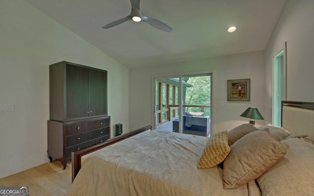 bedroom with ceiling fan, access to exterior, vaulted ceiling, and light hardwood / wood-style flooring