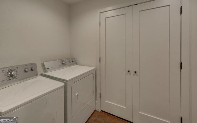 laundry room featuring separate washer and dryer