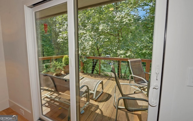 doorway to outside with hardwood / wood-style flooring