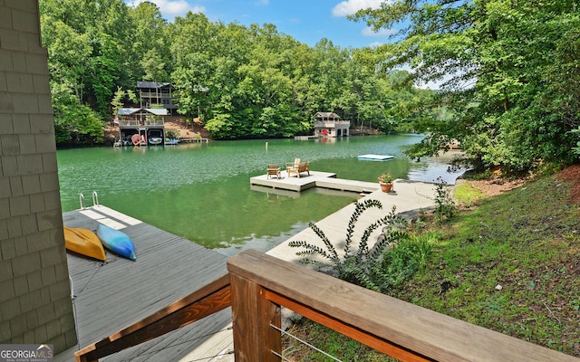 view of dock with a water view