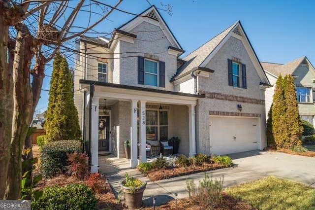 view of front of home with a garage and covered porch