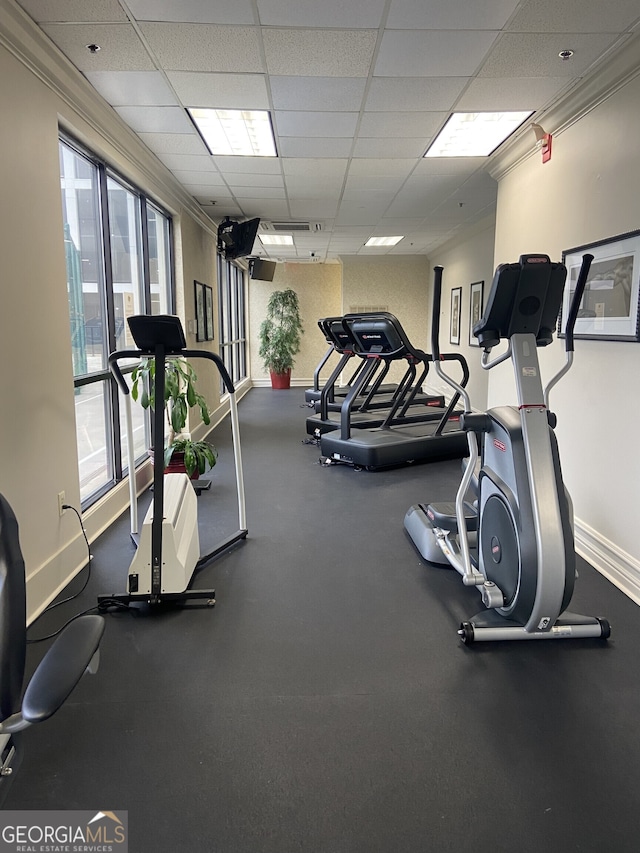 gym featuring a drop ceiling