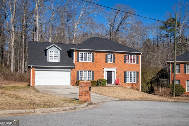 view of front of home with a garage