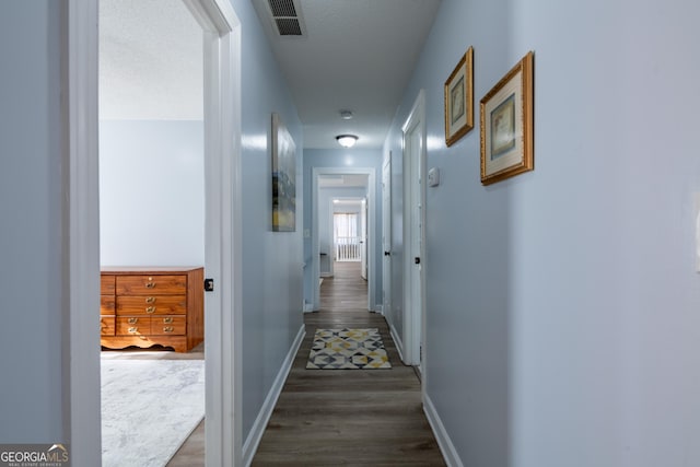 hall featuring dark hardwood / wood-style flooring