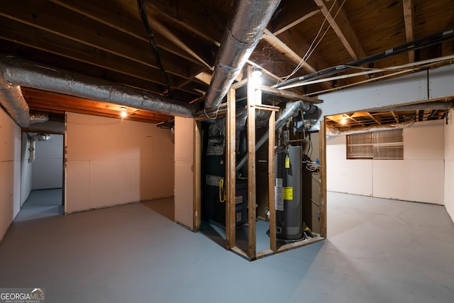 basement with heating unit and gas water heater