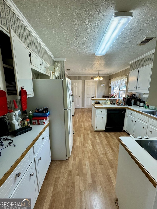 kitchen with white cabinetry, crown molding, decorative light fixtures, black dishwasher, and light hardwood / wood-style floors