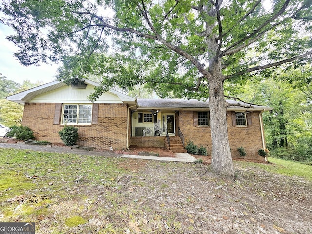 ranch-style home with covered porch