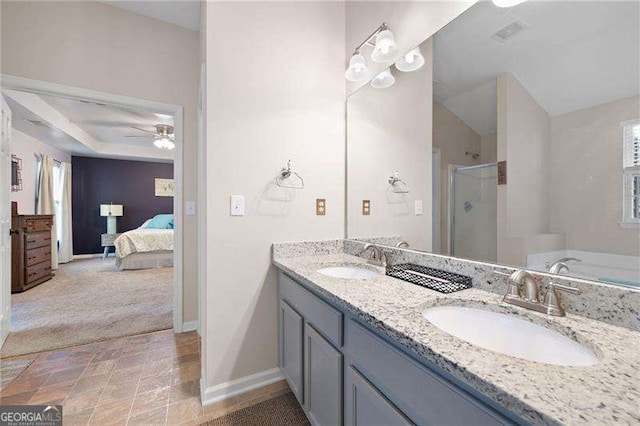 bathroom with vanity, ceiling fan, and separate shower and tub