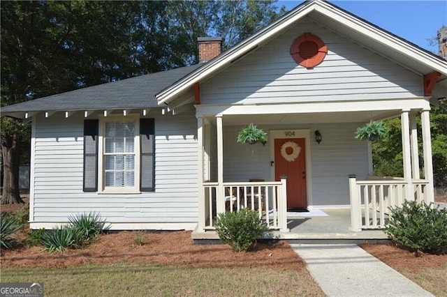 bungalow-style home with a porch