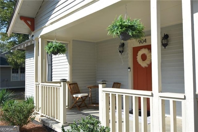 doorway to property with a porch