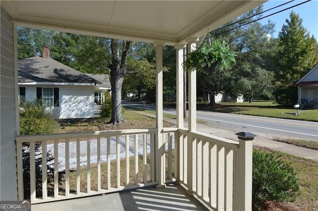 wooden deck with a porch