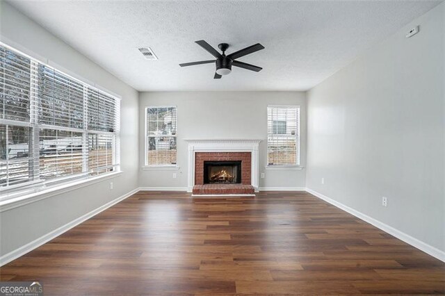 carpeted empty room featuring ceiling fan and a raised ceiling