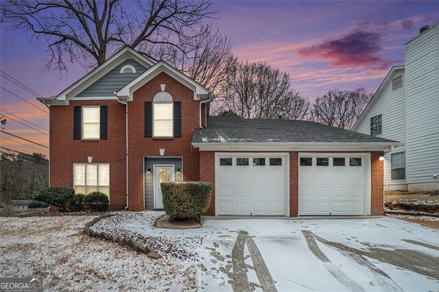 front of property featuring a garage