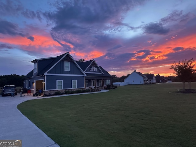 view of front of house with a lawn