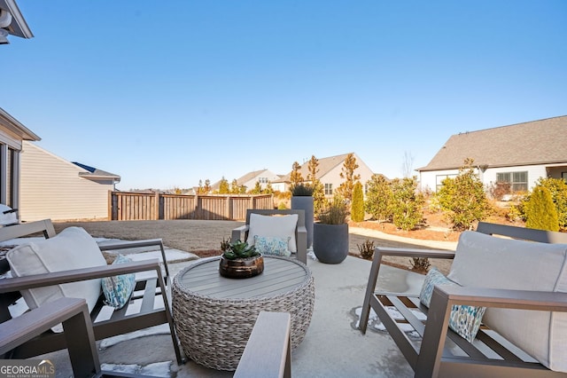 view of patio featuring an outdoor hangout area and a fenced backyard