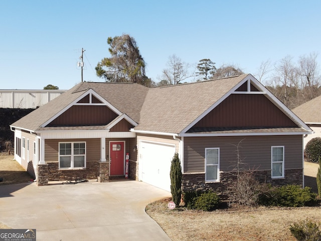 craftsman-style home with a porch and a garage