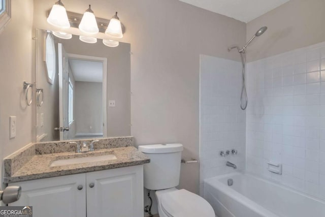 full bathroom with vanity, bathing tub / shower combination, and toilet