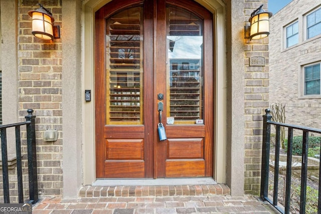 doorway to property with french doors