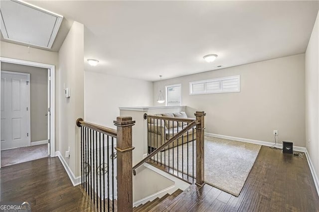 hall featuring dark wood-type flooring