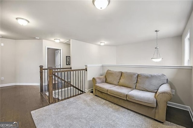 living room featuring dark hardwood / wood-style flooring