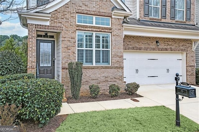 property entrance with a garage