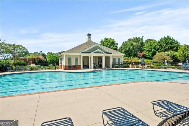 view of pool featuring a patio area