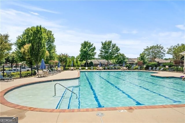 view of pool featuring a patio