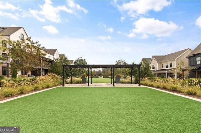 view of yard with a pergola