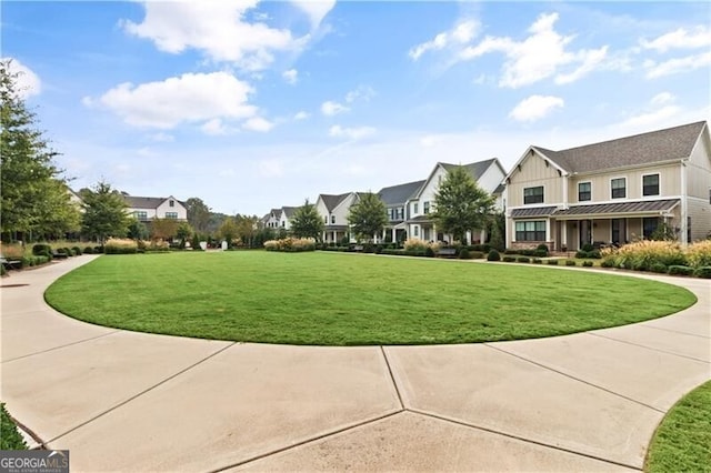 view of community with a lawn