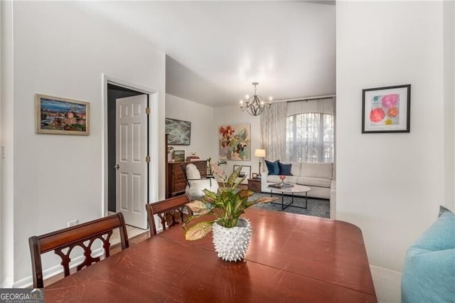 dining room with a chandelier