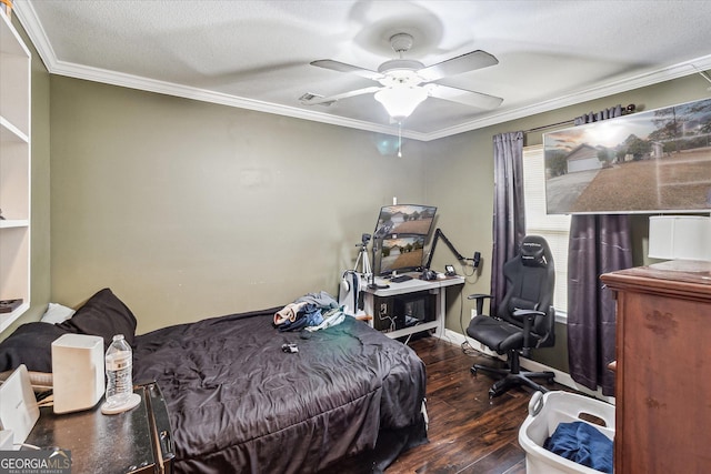 bedroom with crown molding, a textured ceiling, dark hardwood / wood-style floors, and ceiling fan