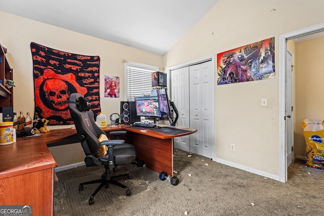 office featuring dark colored carpet and lofted ceiling