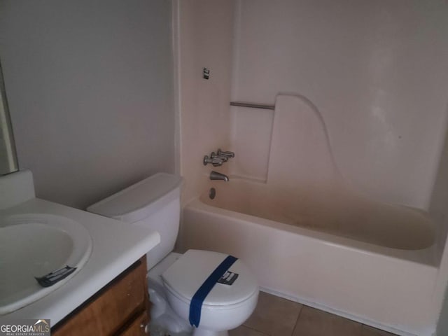 full bathroom featuring shower / tub combination, vanity, toilet, and tile patterned flooring