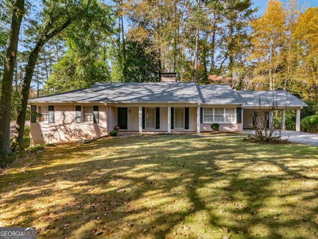 ranch-style house with a front lawn