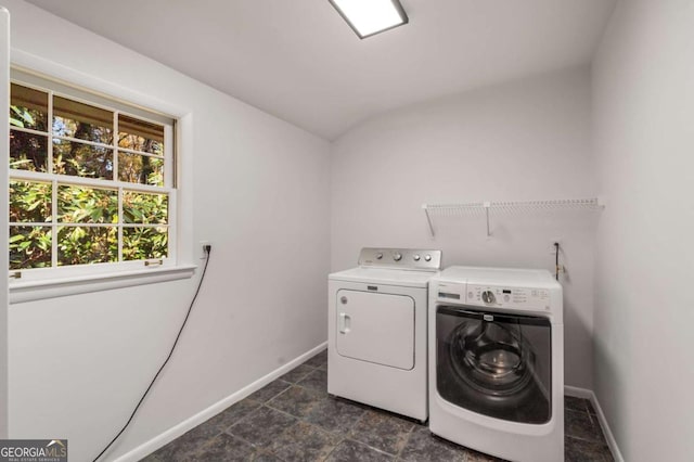 clothes washing area with washer and dryer