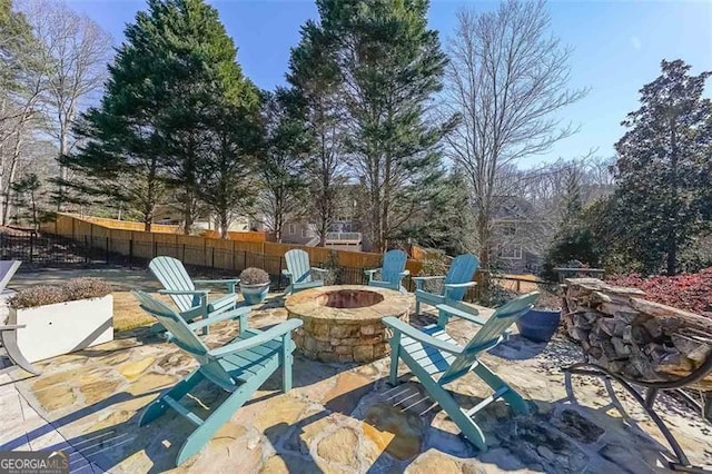 view of patio / terrace with a fire pit