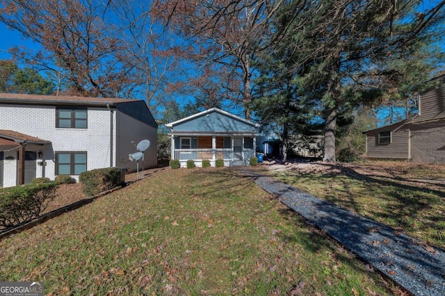 1333 Womack Ave, Atlanta, GA 30344 - view of front of property with covered porch and a front lawn