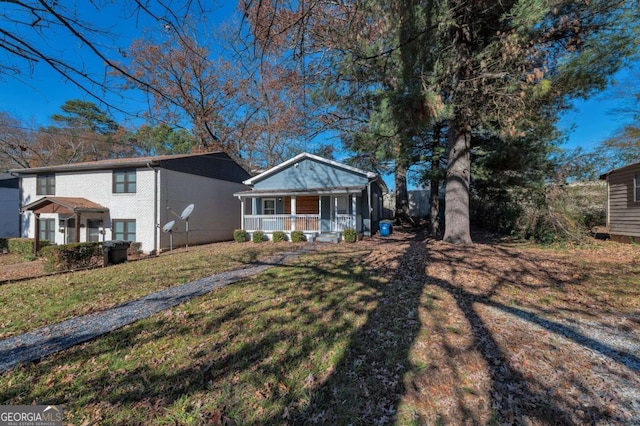 1333 Womack Ave, Atlanta, GA 30344 - view of front of property with a front yard and a porch