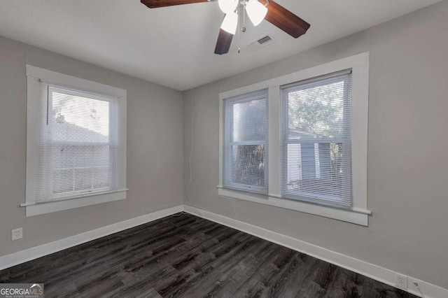 1333 Womack Ave, Atlanta, GA 30344 - unfurnished room featuring ceiling fan and dark hardwood / wood-style flooring