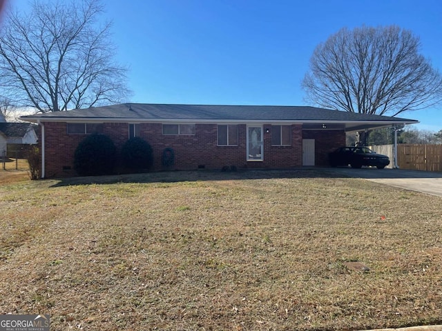 ranch-style house with a carport and a front yard