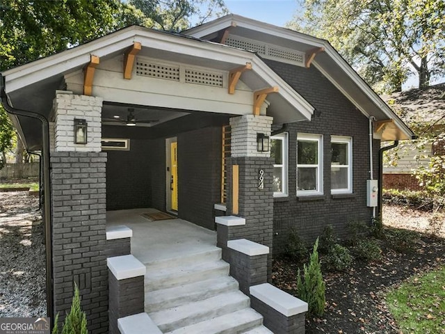 view of front of house featuring ceiling fan