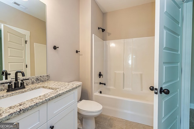 full bathroom with washtub / shower combination, vanity, toilet, and tile patterned floors