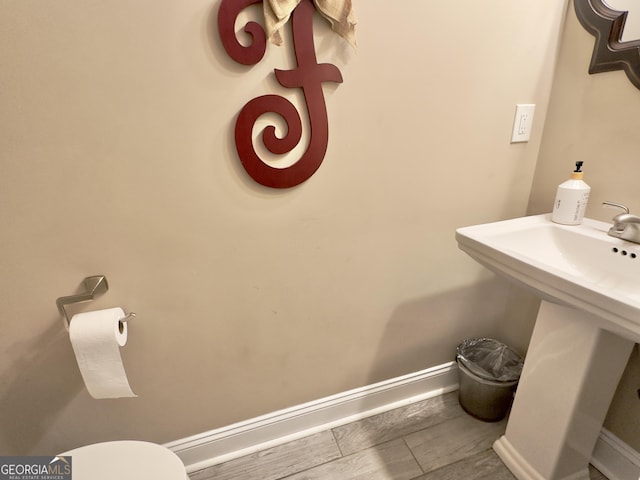 bathroom with tile patterned floors