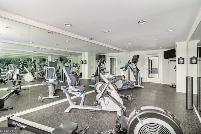 exercise room with ornamental molding