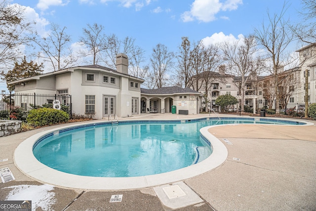 view of pool featuring a patio area