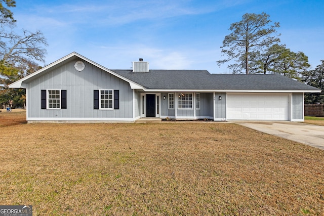 single story home with a garage and a front yard